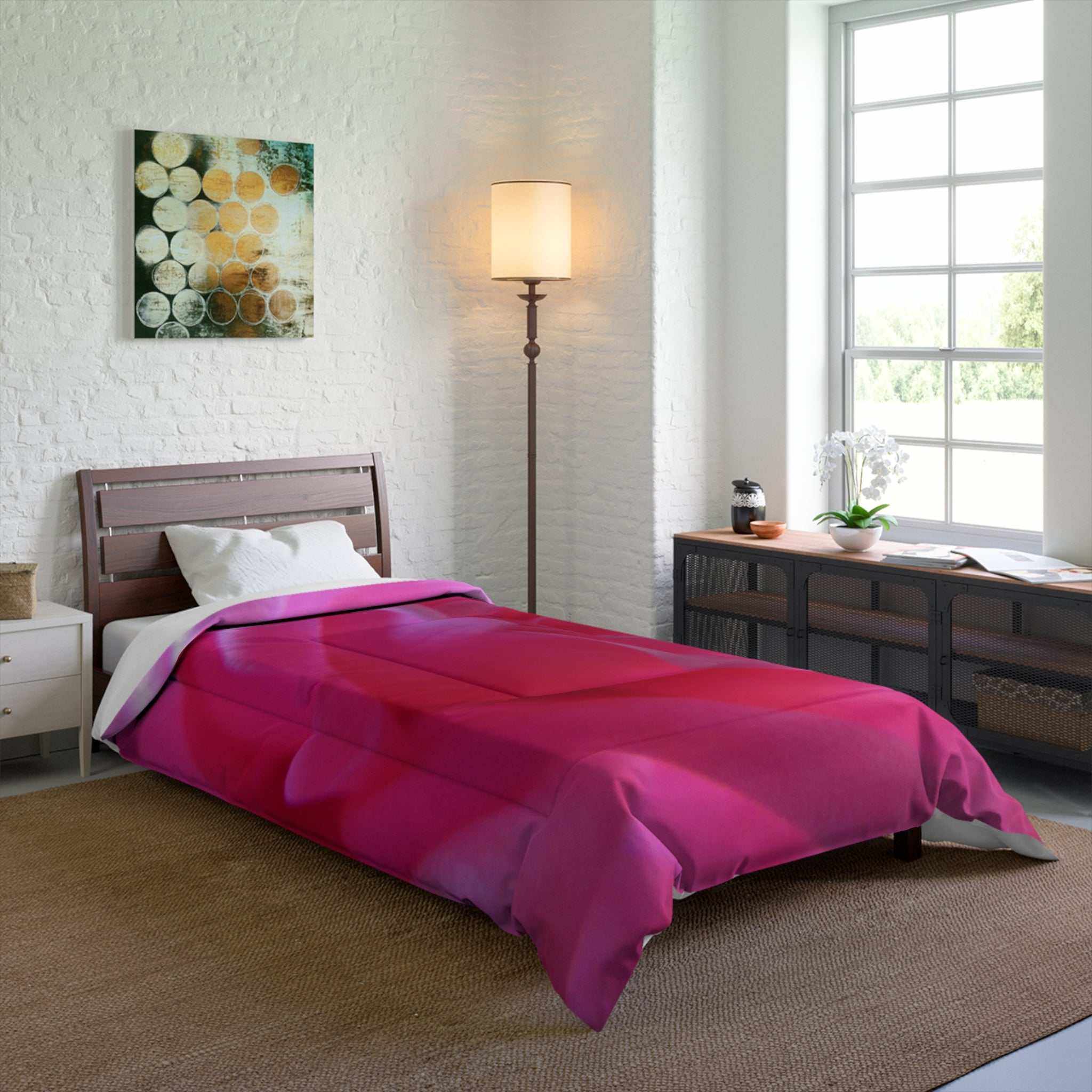 botanical designs bedroom ideas for couples with a bed covered in a pink comforter, lamp, and window.