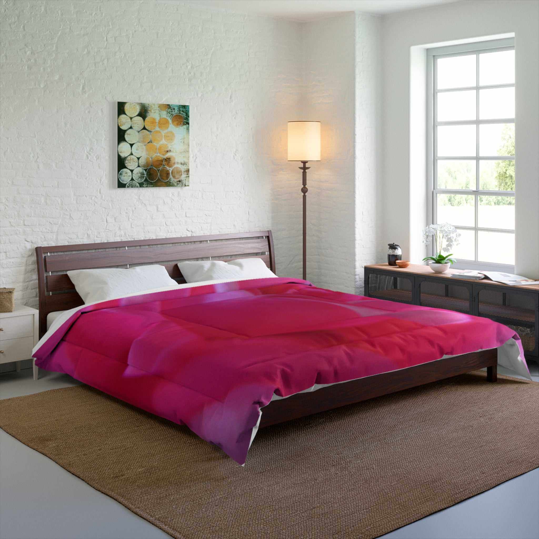 botanical designs bedroom ideas for couples with a bed covered in a pink comforter, wooden headboard, and a lamp on a stand.
