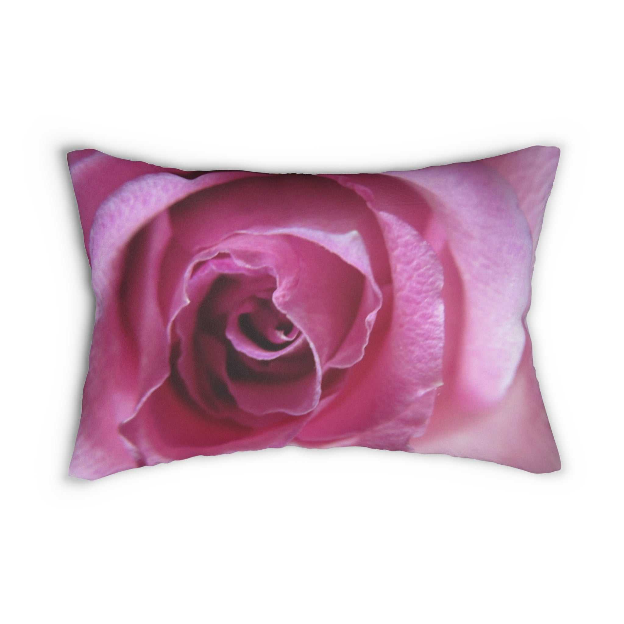 Pillow with a pink rose design on a white background